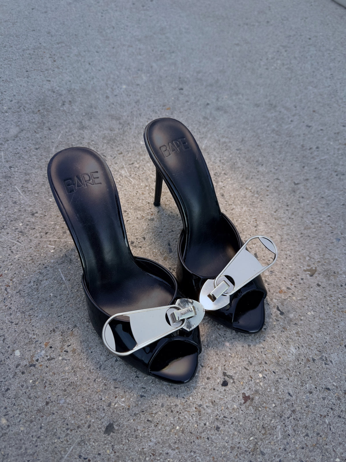 Unveil - Patent Black